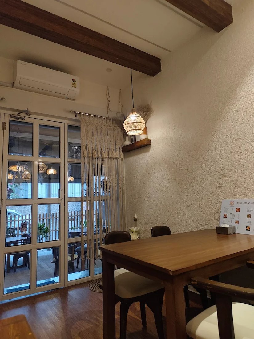 Wood beam ceiling and seating view at Muse